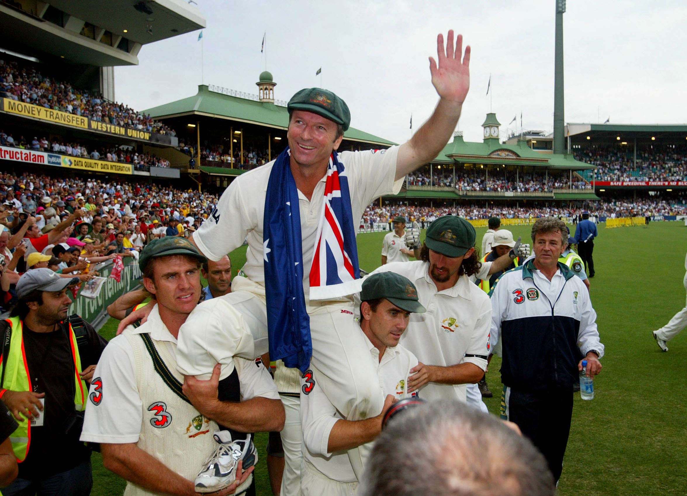 JANUARY 6, 2004: Retiring captain Steve Waugh is chaired on lap of honour around ground to thank fans following his last test, at conclusion of fourth test of Australia v India series at SCG in Sydney, 06/01/04. Pic Phil Hillyard.
Cricket