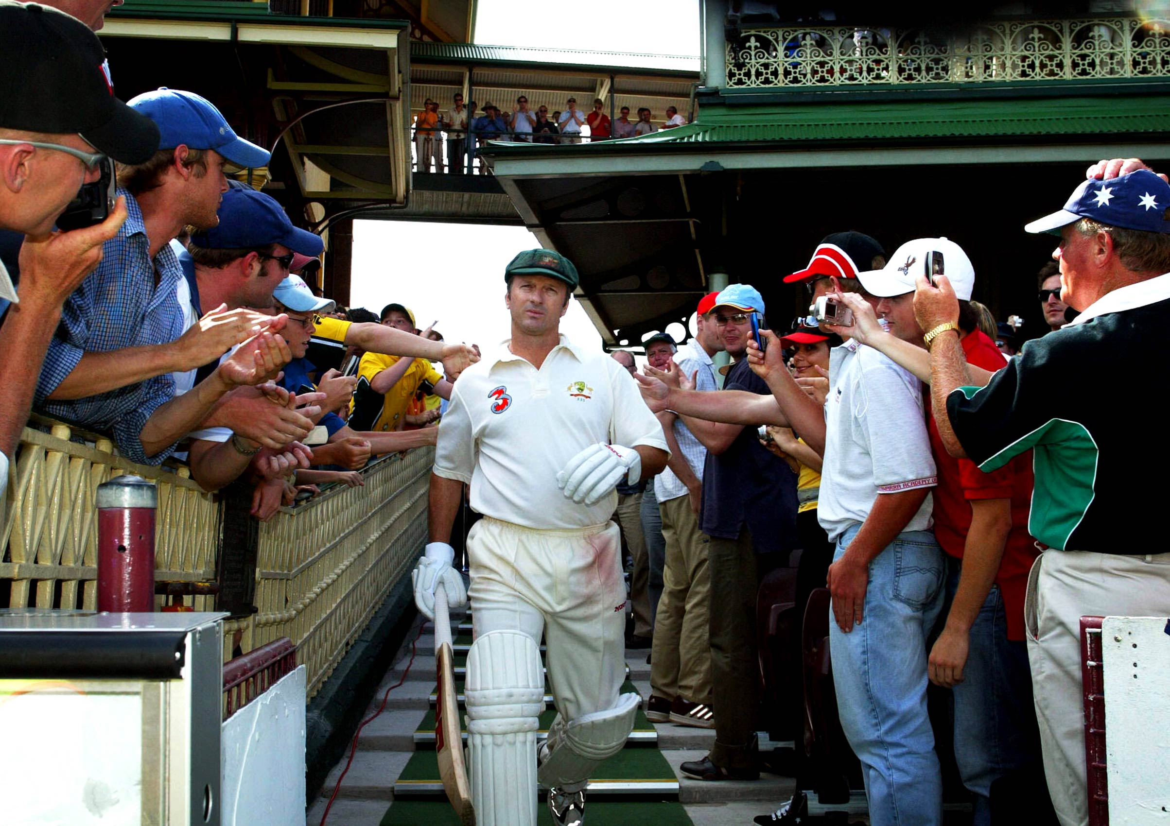   CRICKET - 4.1.04 - Australia v India at the SCG. Steve Waugh makes his way out to bat during his last Test match in Sydney. pic. Phil Hillyard 
  