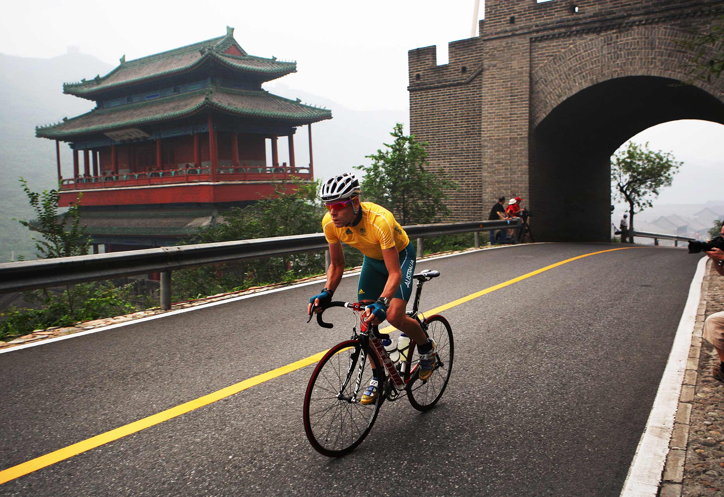   Beijing Olympics 2008. Cadel Evans passes through parts of the Great Wall during the Australian men