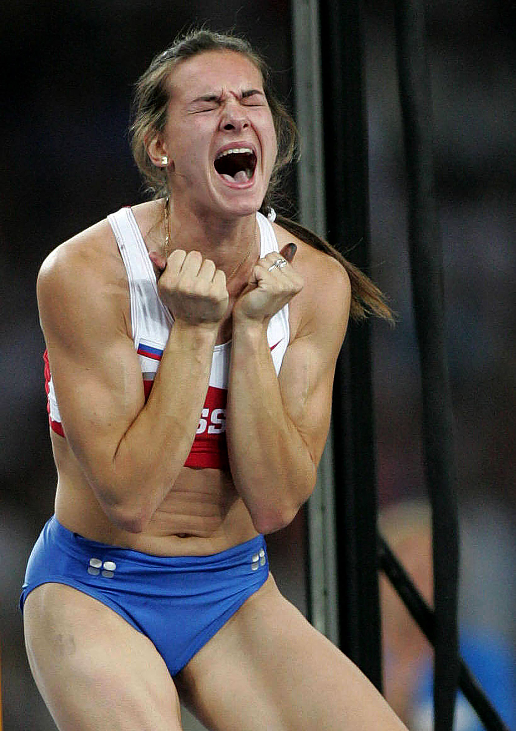   Athens Olympics 2004 Day11 - Athletics - Yelena Isinbayeva beats our own World Record in the Pole Vault clearing 4.91m to give her the Gold medal.  pic. Phil Hillyard.  
